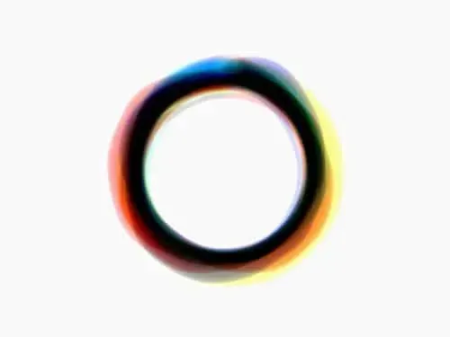 A dark ring on near-white paper, colour bleeding out of the stroke on all sides